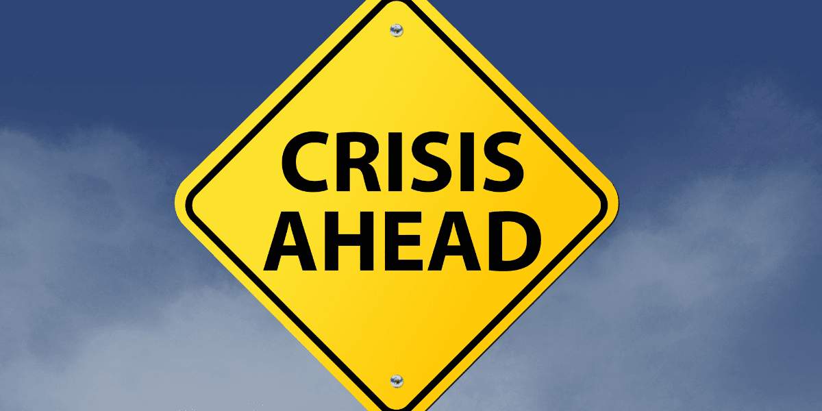Skylt med texten "crisis ahead"