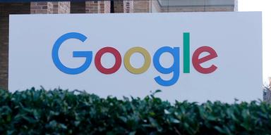 En bild som visare en skylt med företagsnamnet Google.